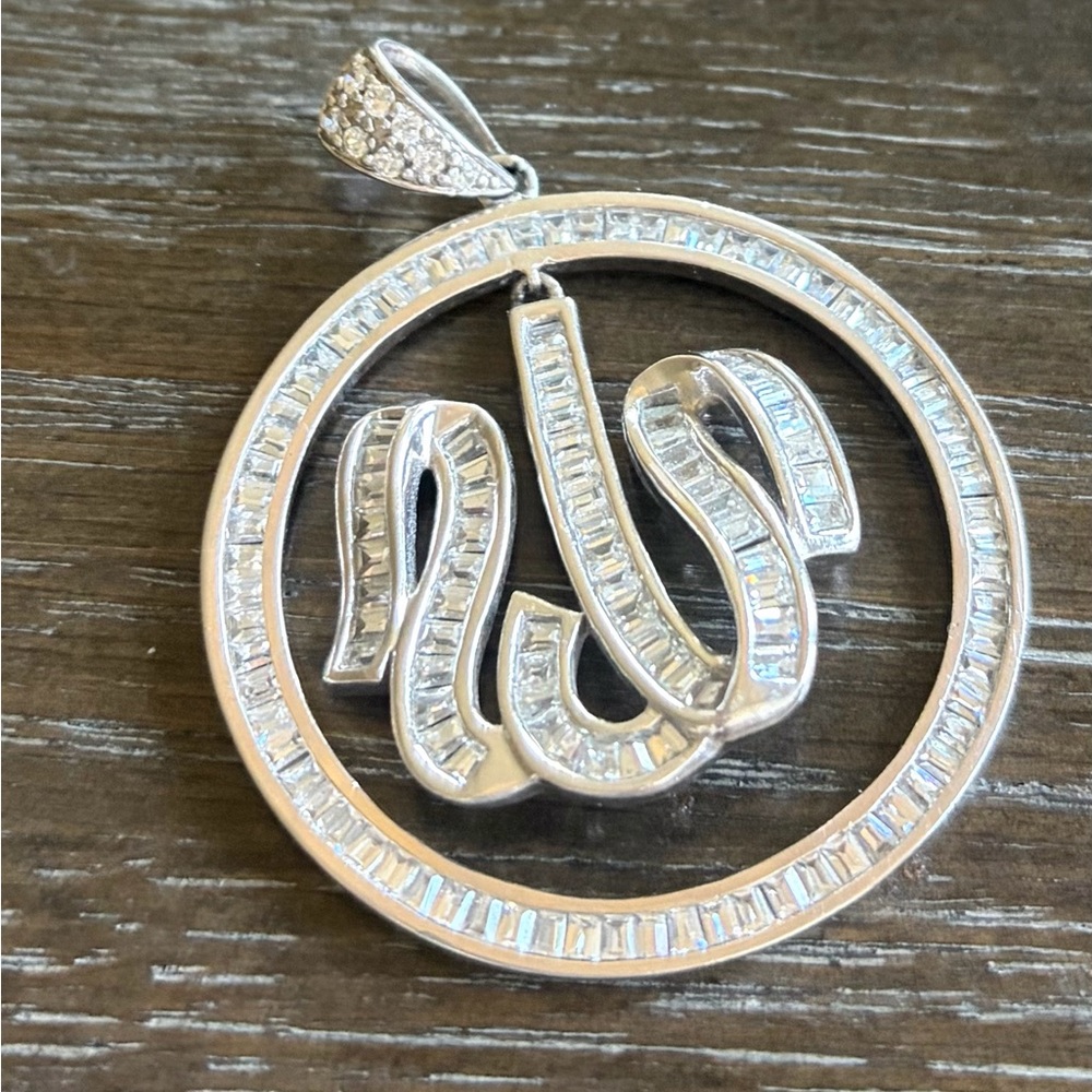 Sterling silver with zirconia Allah pendant.